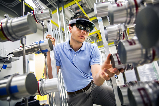 student uses device to check for radiation