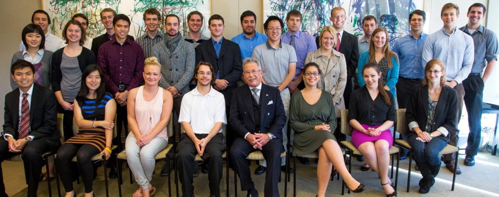 Smiling group of College of Engineering students and faculty