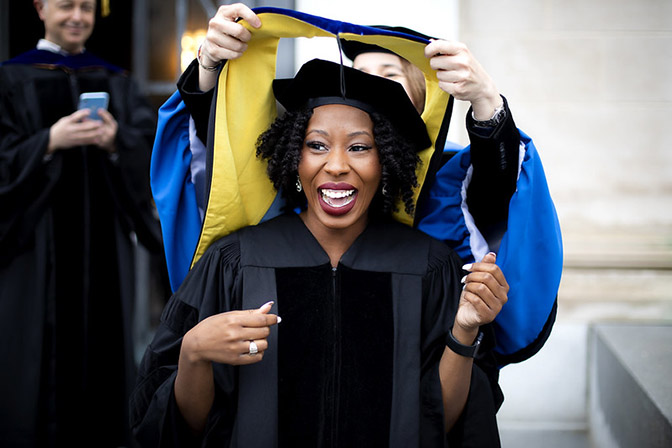 ciara sivels is given a stole at graduation