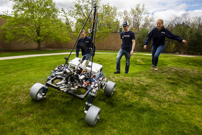 The Michigan Mars Rover Team (MRover) test out their unit at the Wave Field near the Francois-Xavier Bagnoud Building on North Campus in Ann Arbor Michigan.
