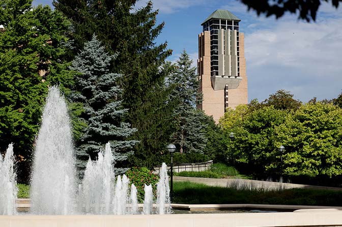 View of the Ann and Robert H. Lurie Tower on the North Campus of the University of Michigan in Ann Arbor on Tuesday, July 26, 2022. In the foreground is the Class of 47E Reflecting Pool and Fred’s Fountain.
Photo: Brenda Ahearn