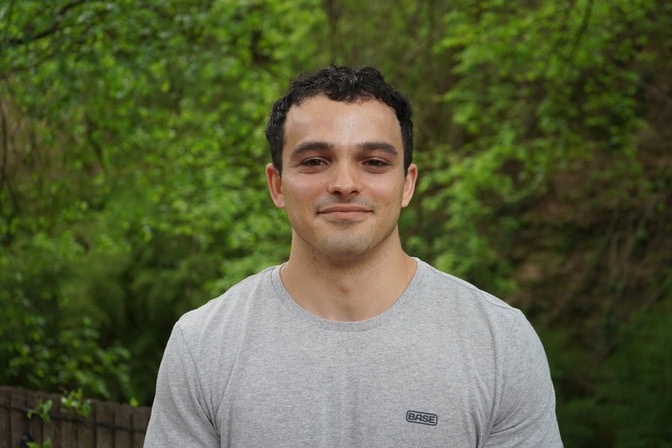 Portrait of Justin Lopas.